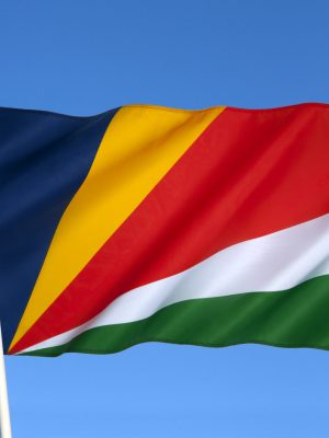 The flag of the Seychelles was adopted on June 18, 1996. The Seychelles are a group of about ninety islands in the Indian Ocean, about 1,000 km (600 miles) northeast of Madagascar,