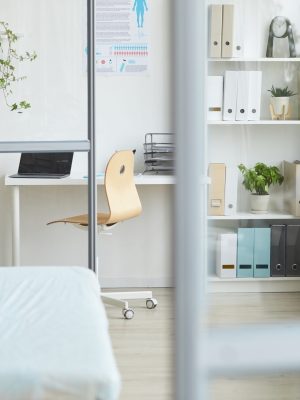Horizontal no people shot of modern doctor's office interior in hospital in daylight, copy space