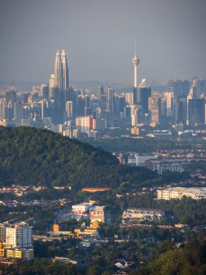Kuala Lumpur skyline seen at dawn from Bukit Tabur Mountain, Malaysia, Southeast Asia