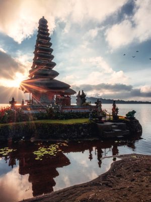 Sunrise shining on ancient temple of Pura Ulun Danu Bratan on Bratan Lake at Bali, Indonesia